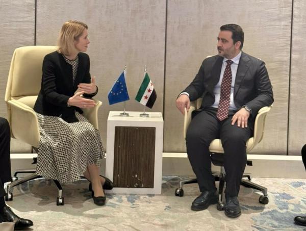 وزير الخارجية السوري ومسؤولة السياسة الخارجية في الاتحاد الأوروبي